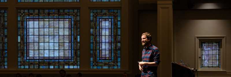 Brian speaking at a conference